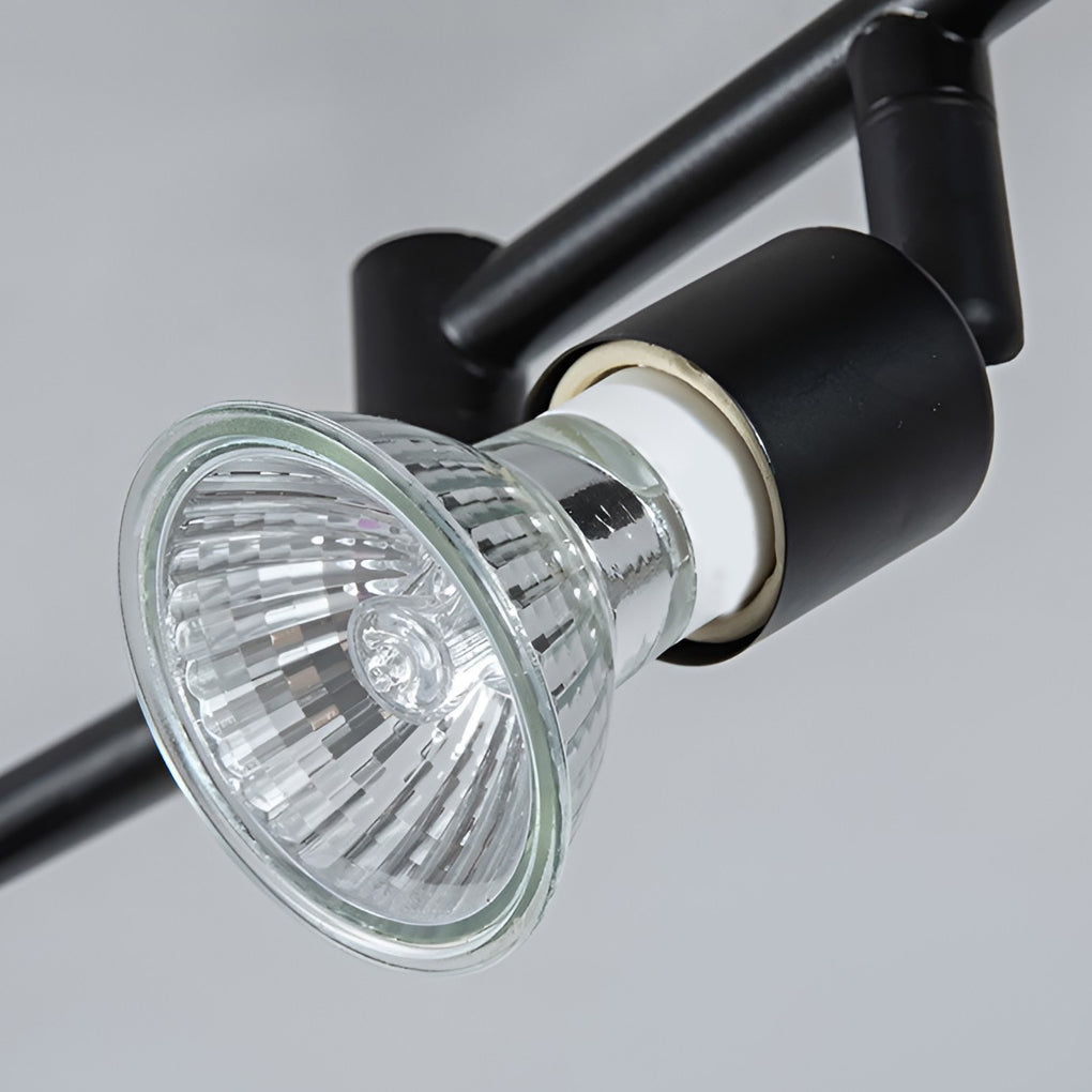 Black adjustable ceiling lights close-up highlighting spotlight head design and GU10 bulb compatibility.