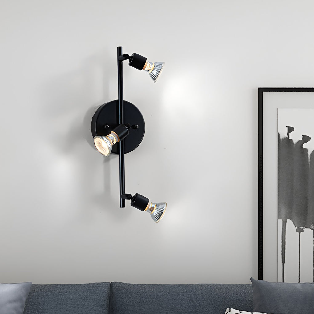 Black adjustable ceiling lights wall-mounted version, providing directional accent lighting in a modern interior.