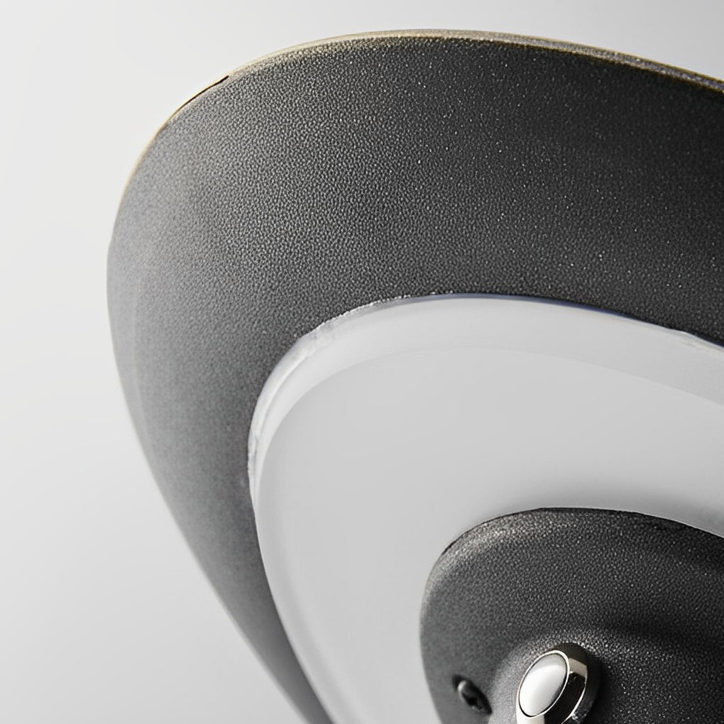 Black brass path lights with top view highlighting the solar panel.