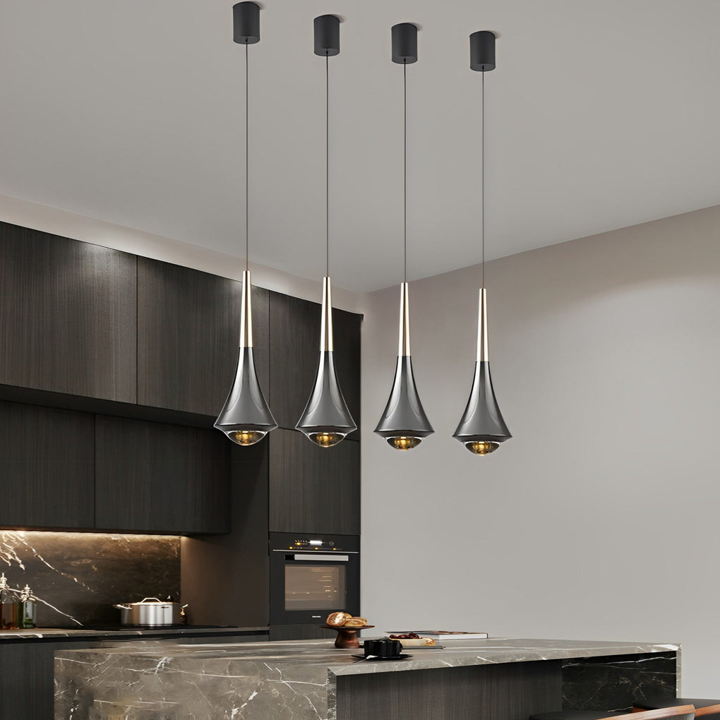 Clustered black cone pendant lights illuminating a contemporary kitchen workspace.