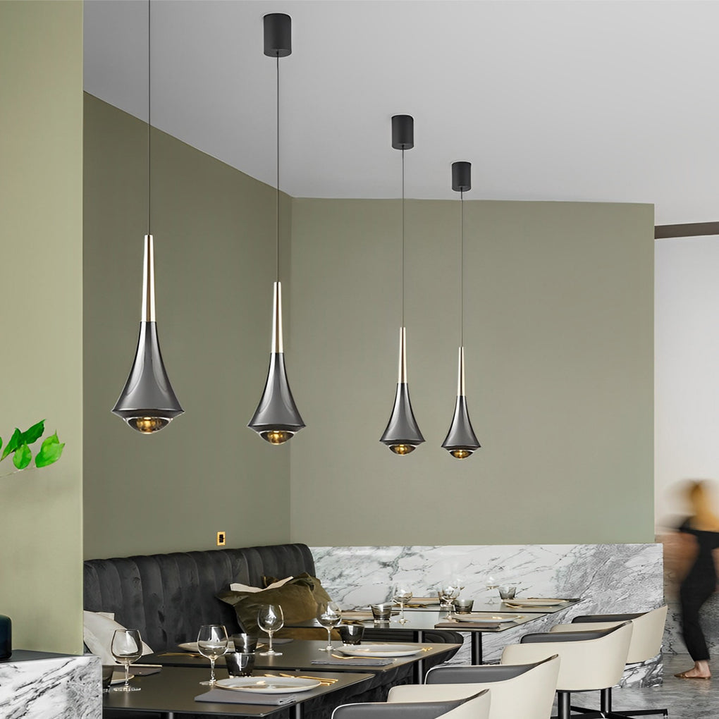 Row of black cone pendant lights enhancing a modern restaurant dining area.