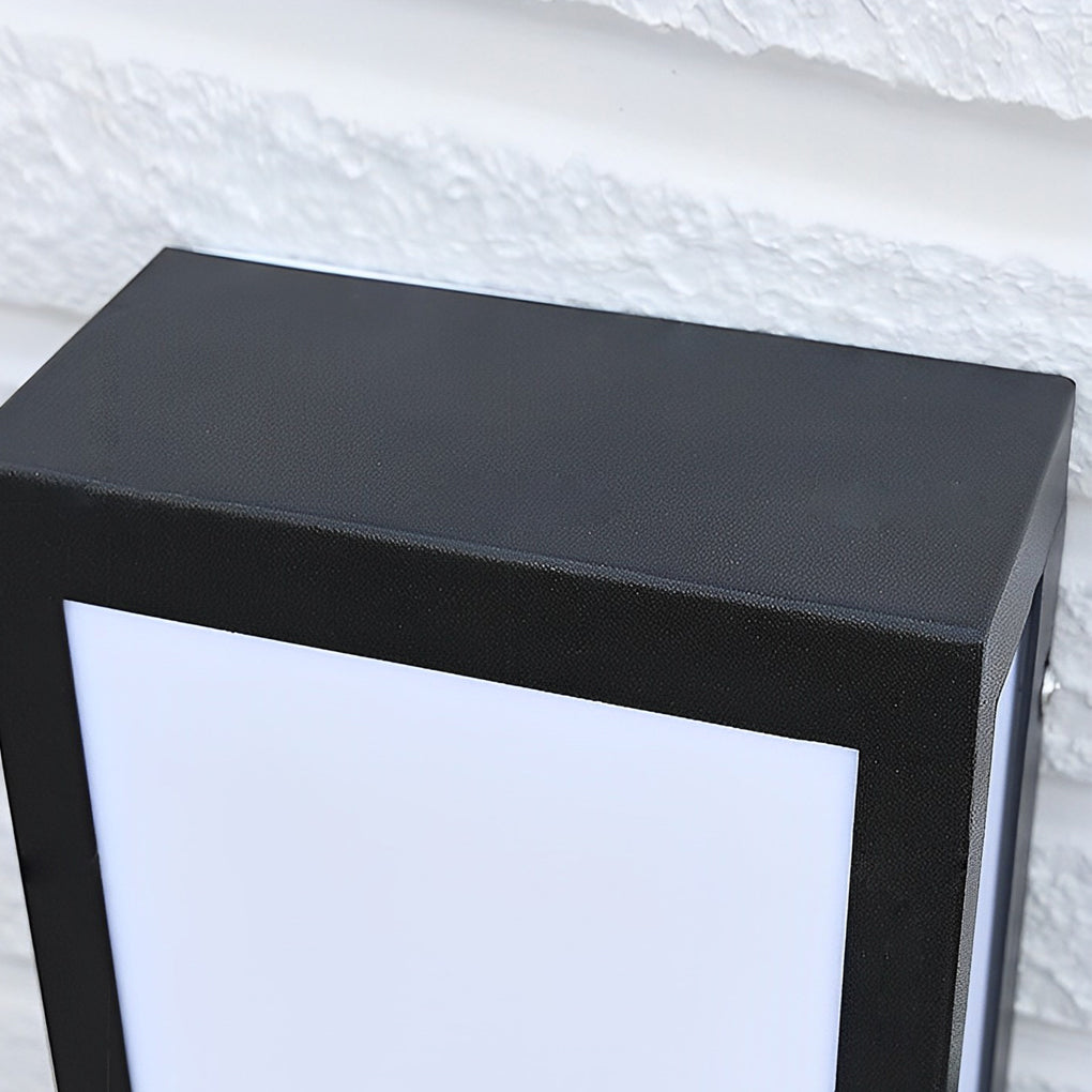 Rectangle outdoor wall lighting with black frame on modern house facade.