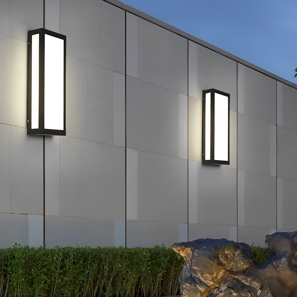 Rectangle outdoor wall lighting with black frame on white exterior wall.