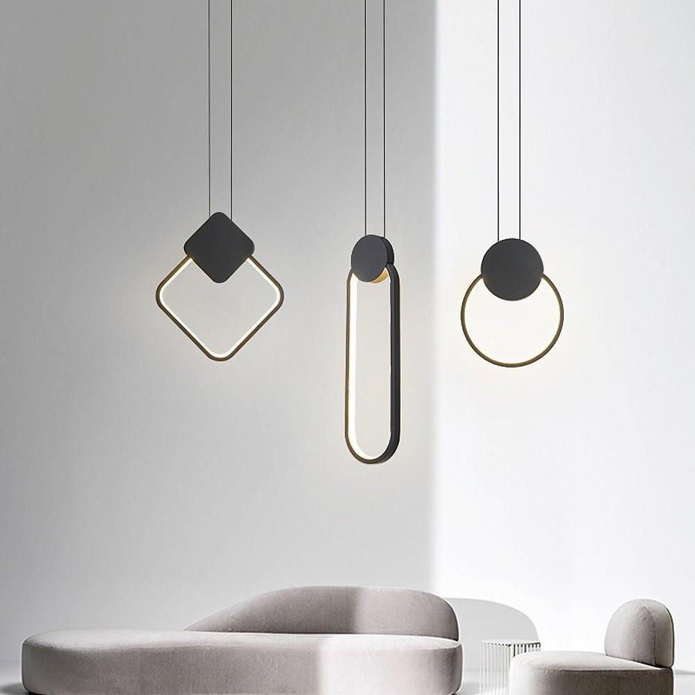 Set of black geometric pendant lights featuring ring and rectangular shapes.