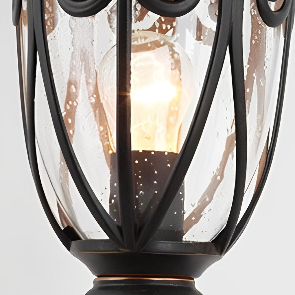 Black outdoor pillar light standing alone, highlighting its classic design and sturdy construction.