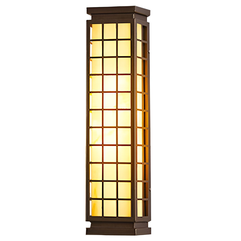 Black outdoor sconce light featuring grid pattern and warm lighting on white background.