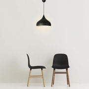 Modern black pendant light fixture with a sleek minimalist design for contemporary spaces.