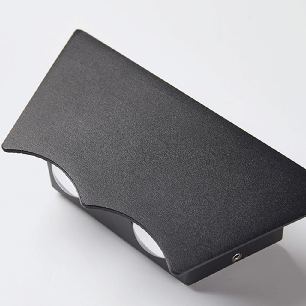 Black up down wall light product angle view highlighting matte black finish and dual light openings.