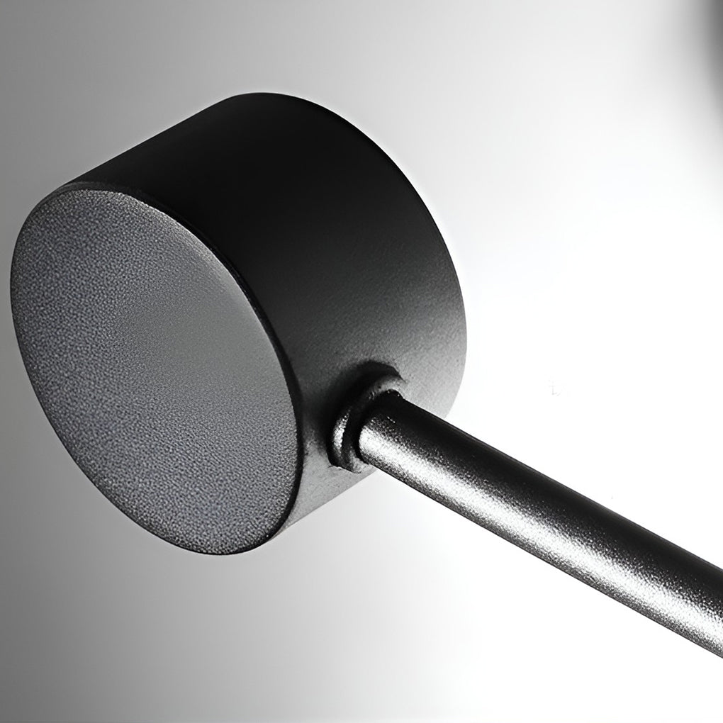 Black wall light with side view showing depth and light diffusion.