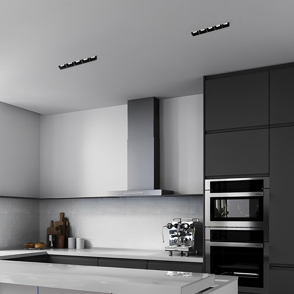 Blue illuminated ice cube solar light close-up on gravel.