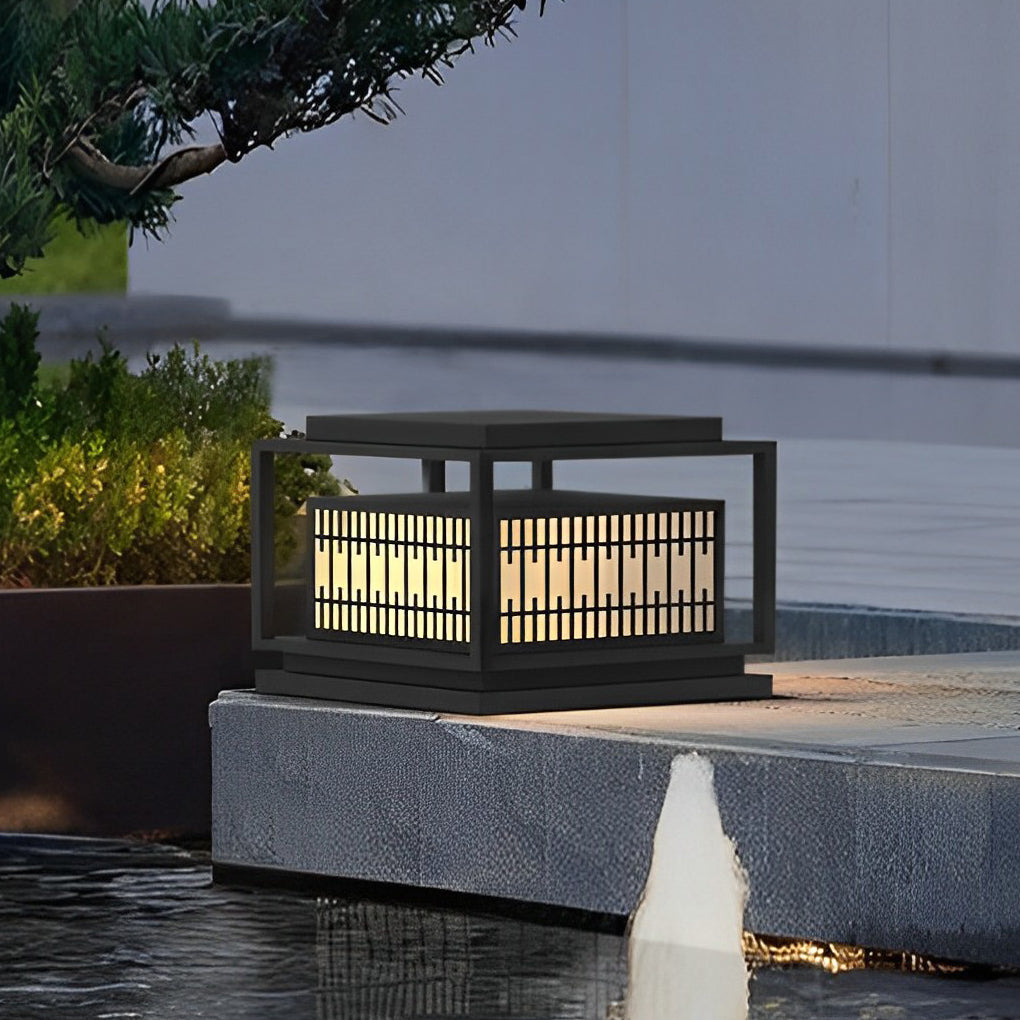 Bollard path lights enhancing a stylish outdoor fence with ambient light.