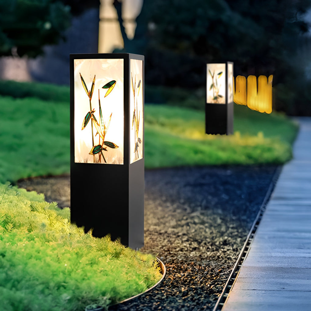 Bollard pathway lights providing elegant illumination for a contemporary garden.