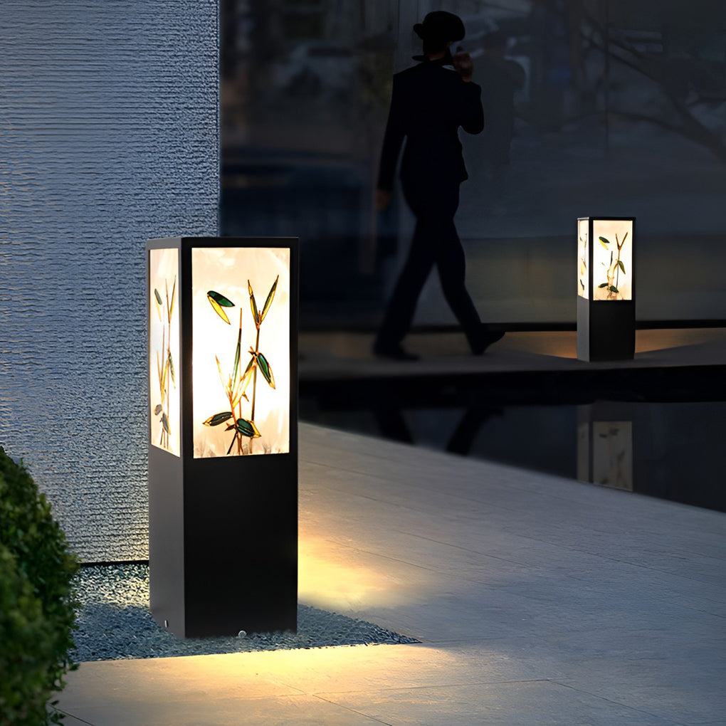 Bollard pathway lights illuminating a minimalist outdoor corridor with focused glow.