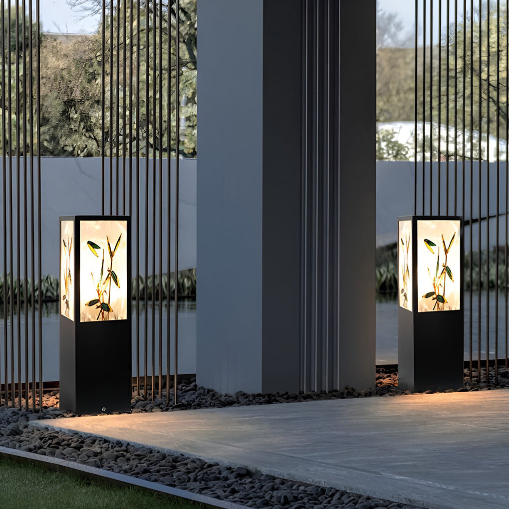 Bollard pathway lights providing soft illumination along a stylish garden pathway.