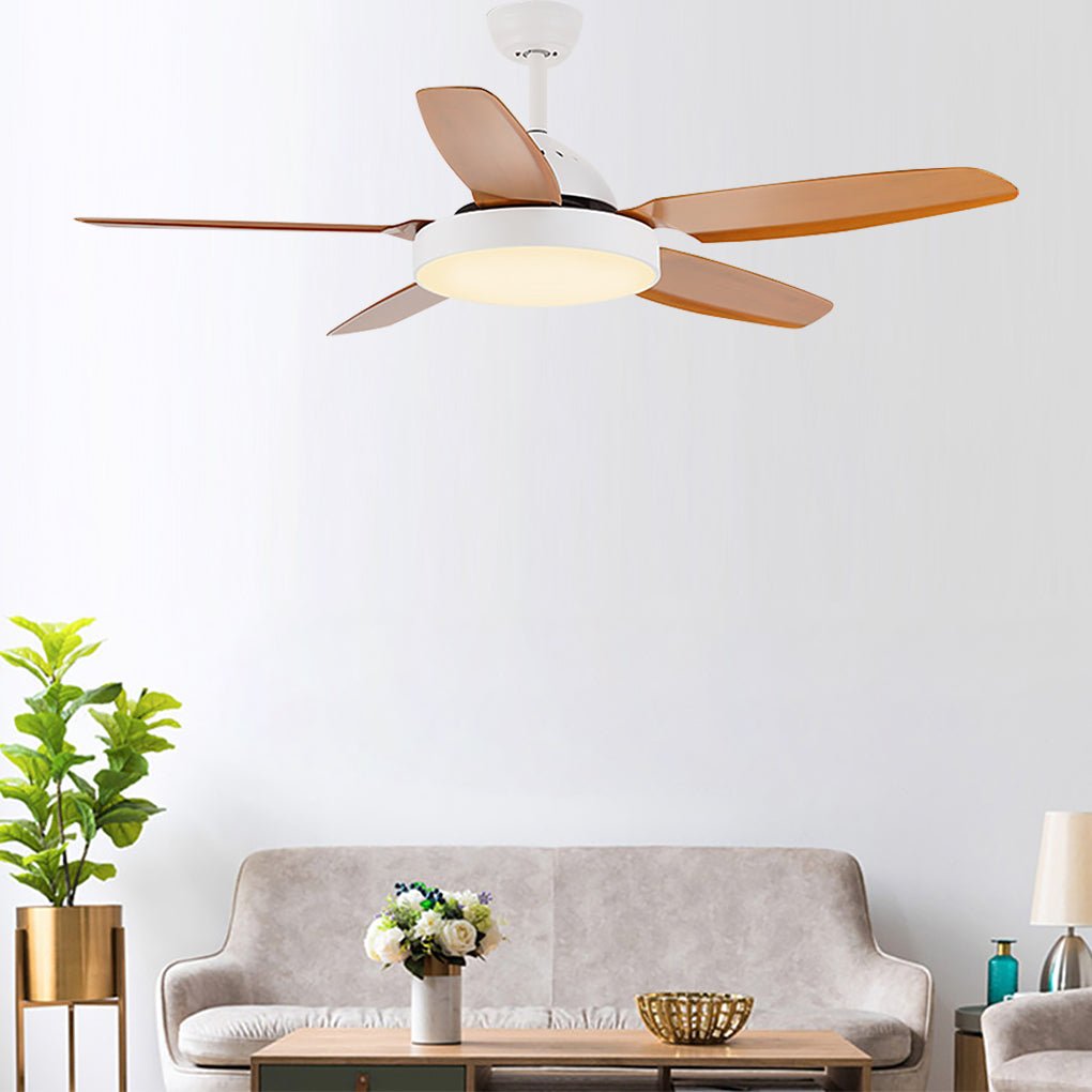 Brown ceiling fan with light providing soft illumination in a stylish living room.