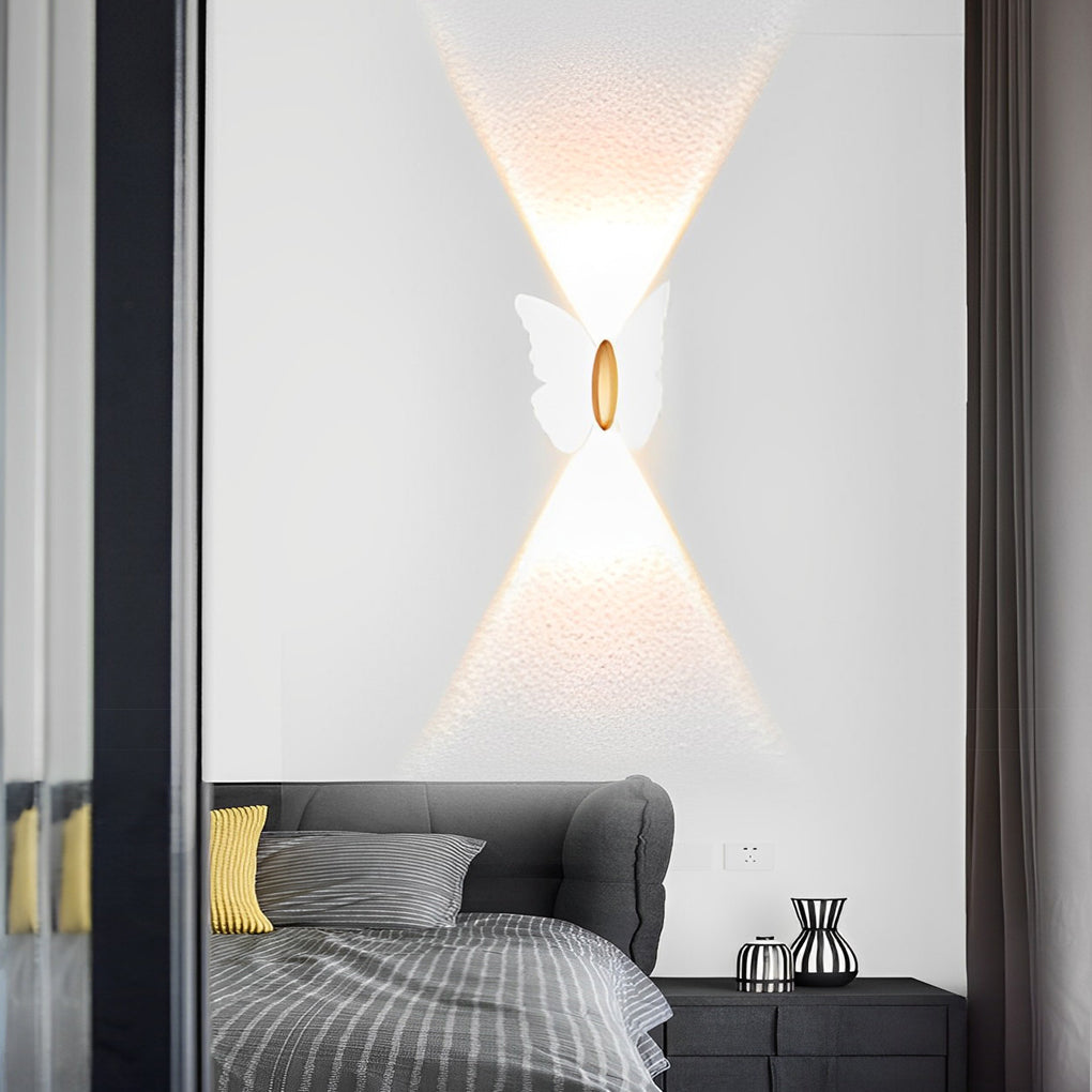 Butterfly wall lamp with detailed view of its black butterfly structure.