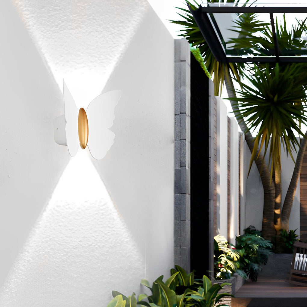 Butterfly wall lamp providing elegant illumination for a contemporary bedroom.