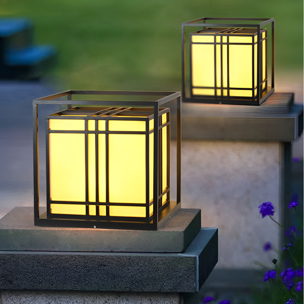 Caged pillar lights with close-up of their geometric design and light output.