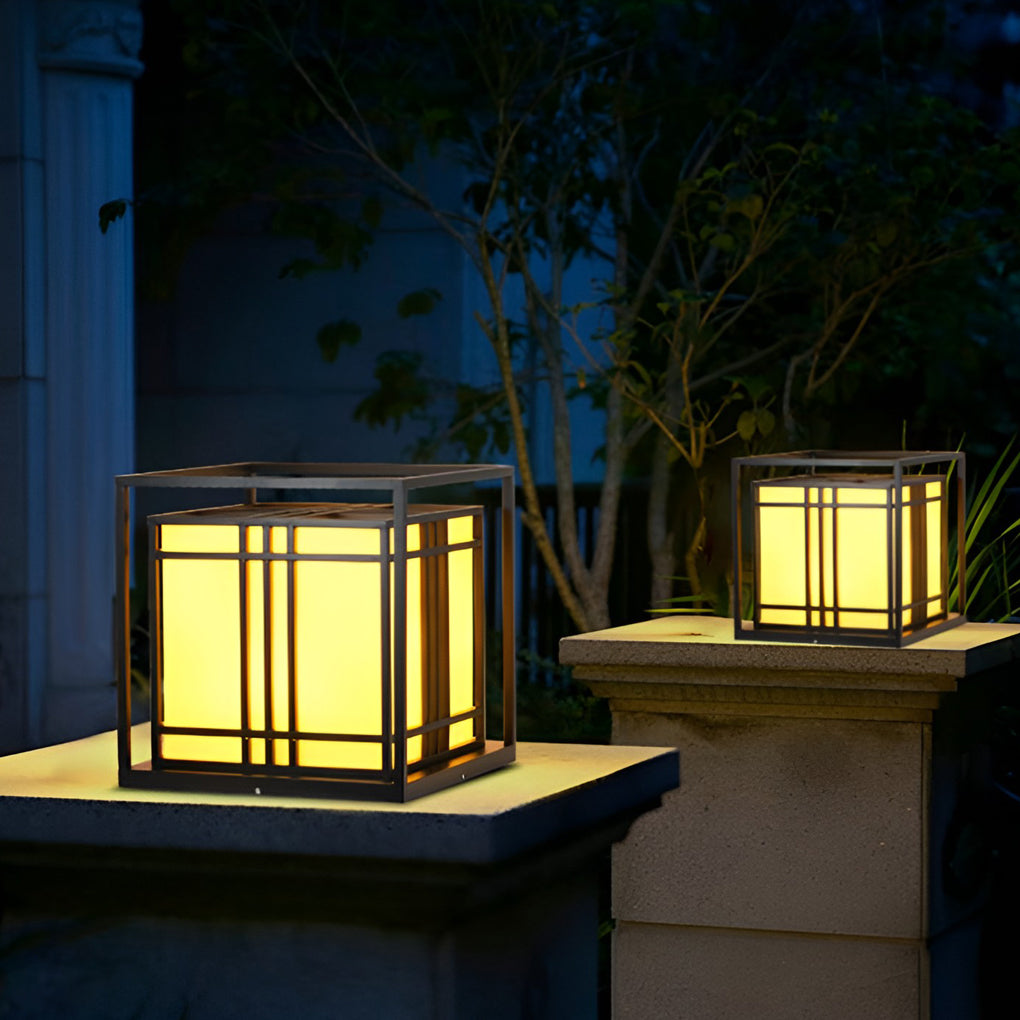 Caged pillar lights providing elegant illumination for a contemporary garden.