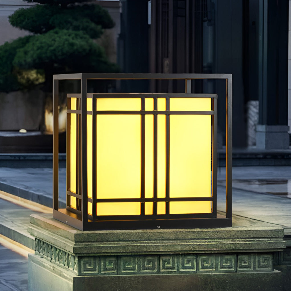 Caged pillar lights illuminating a cozy outdoor deck with directional glow.