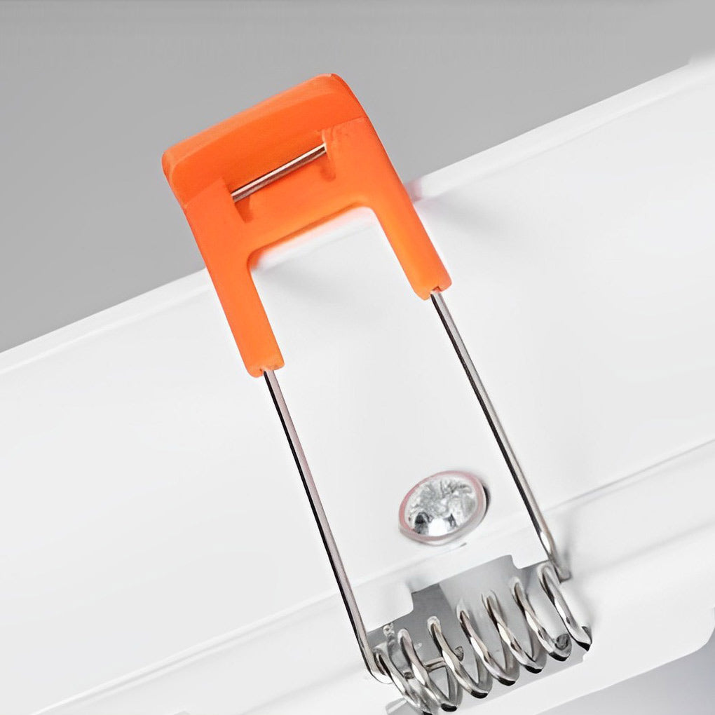 Ceiling twin light installation tool and mounting springs for recessed lighting setup.