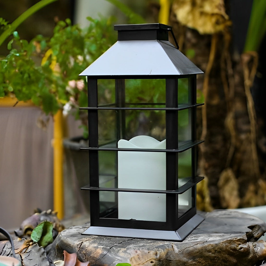 Candlestick lantern with classic design on garden grass.