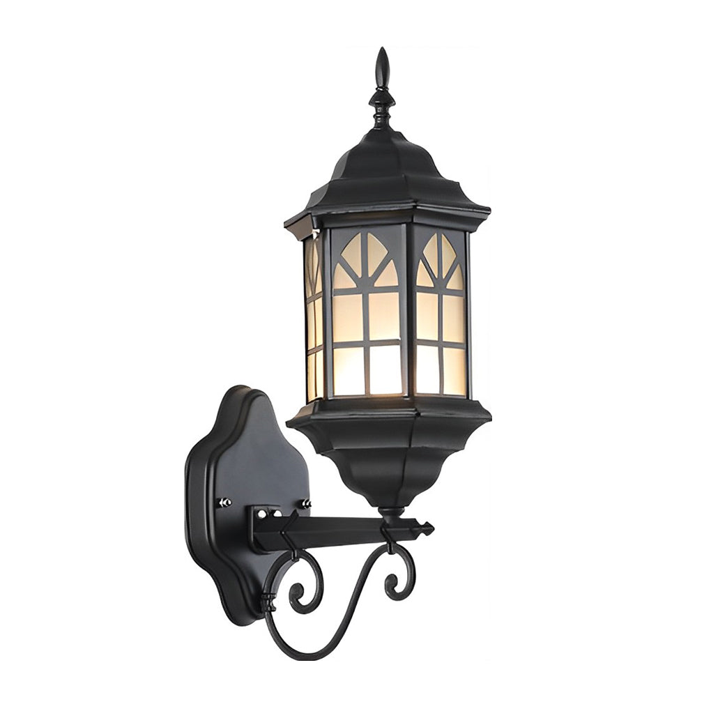 Classic porch light with bronze finish and frosted glass, providing warm illumination for a residential driveway.