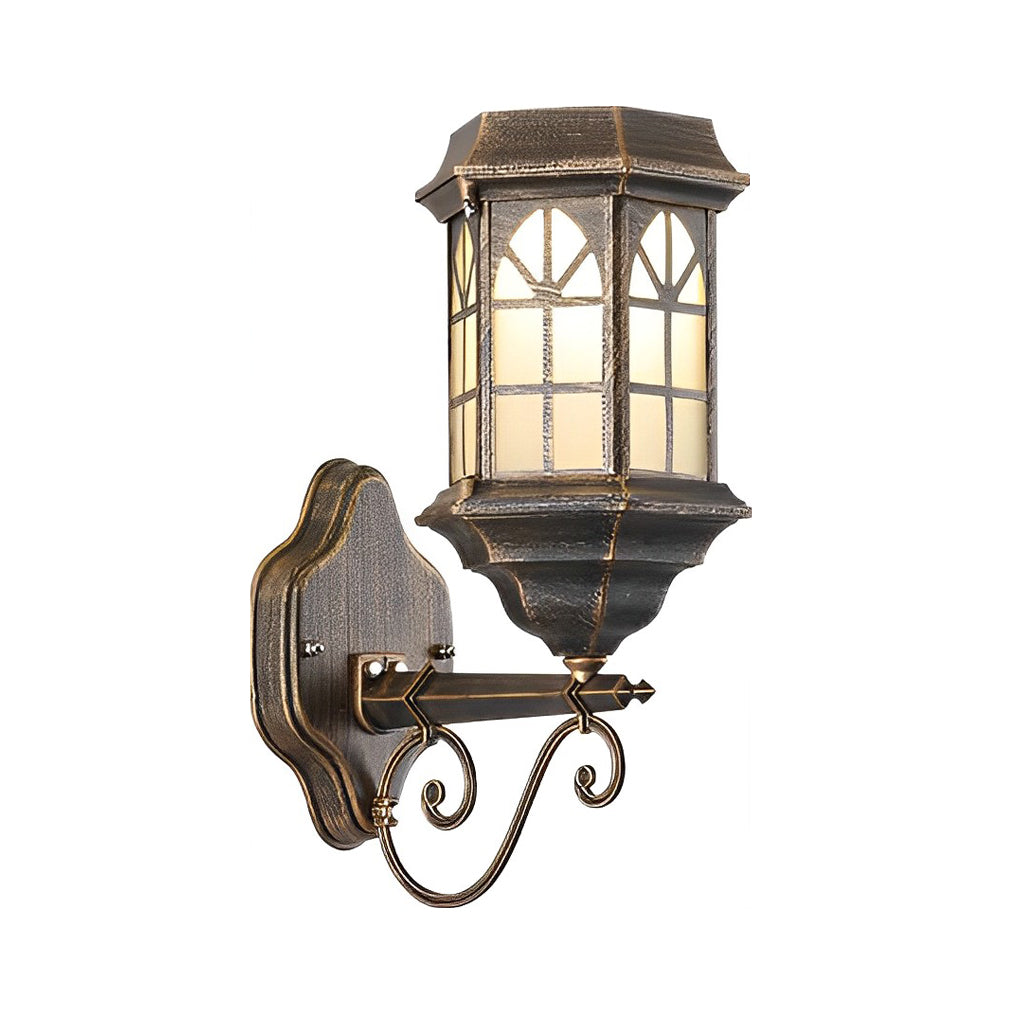 Classic porch light in bronze, featuring frosted glass and decorative scroll arm, mounted on a garage exterior.