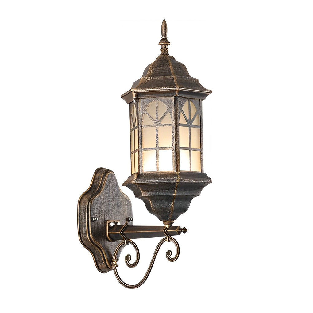 Classic porch light in bronze with frosted glass panels, adding a touch of elegance to an outdoor garden setting.