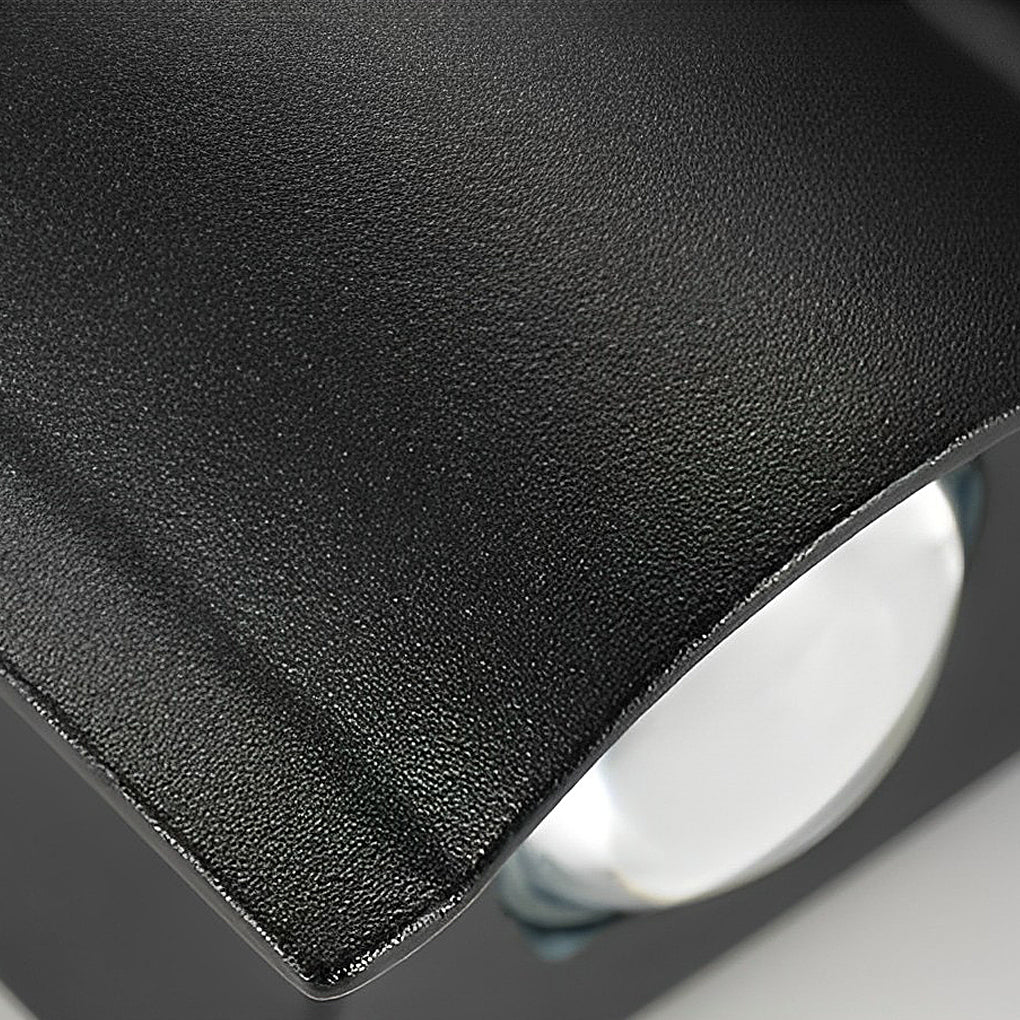 Close-up of black up and down outdoor wall lights showing detailed texture and sleek design.