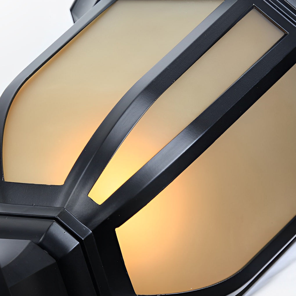 Extreme close-up of frosted glass panels on a vintage outdoor pillar lantern with black frame.