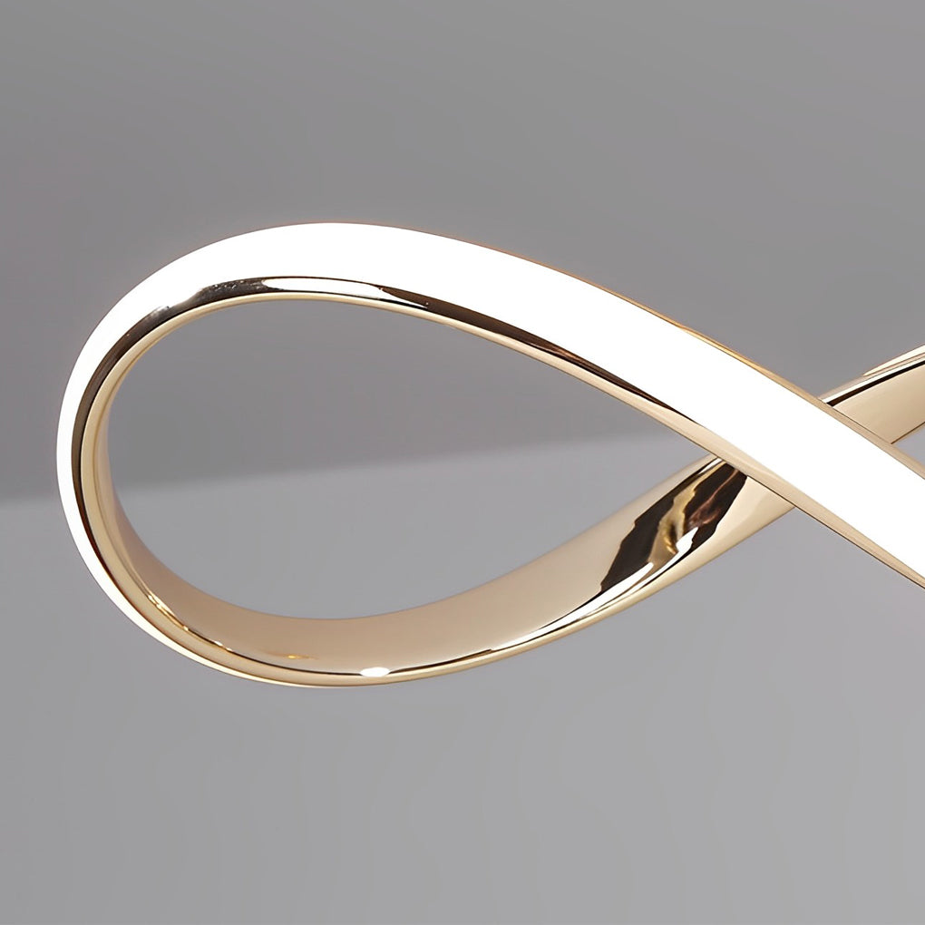 Waveform pendant light in gold finish with close-up view of elegant curve design.