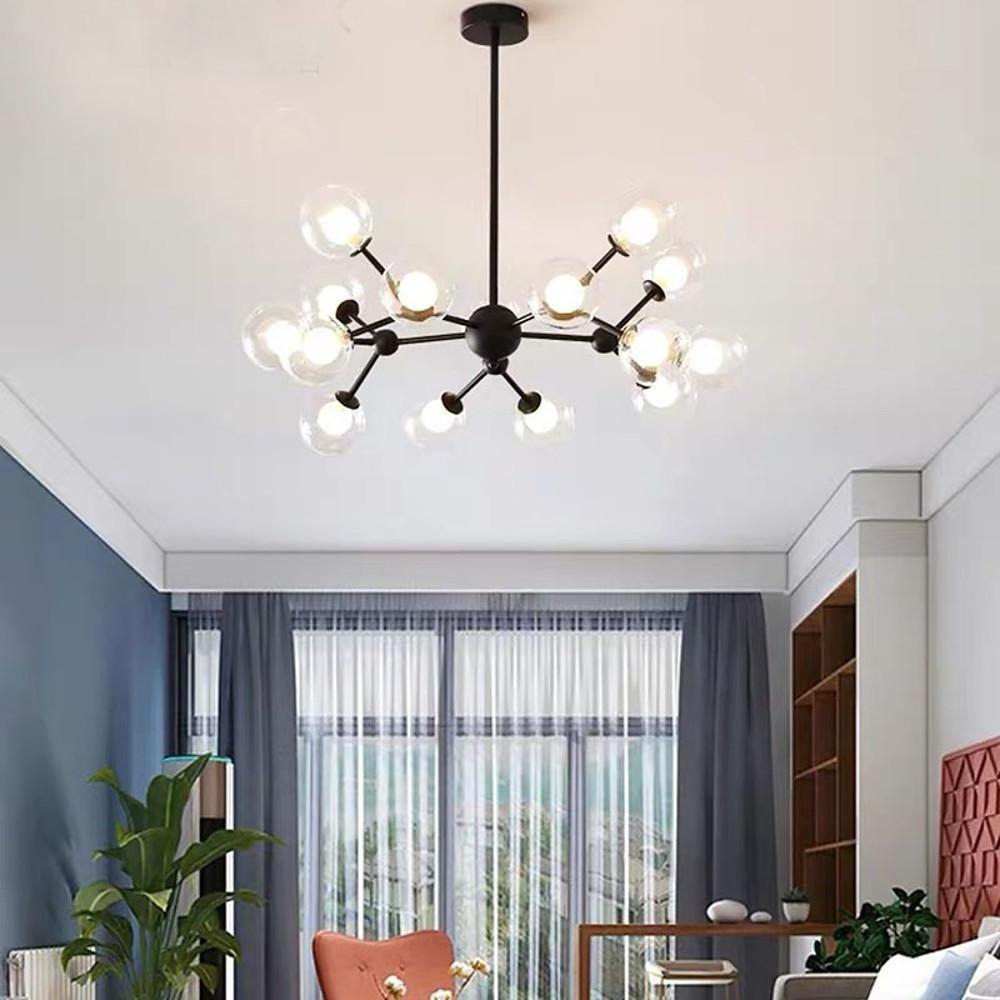 Minimalist living space enhanced by a compact glass sputnik light with evenly spaced clear globes.