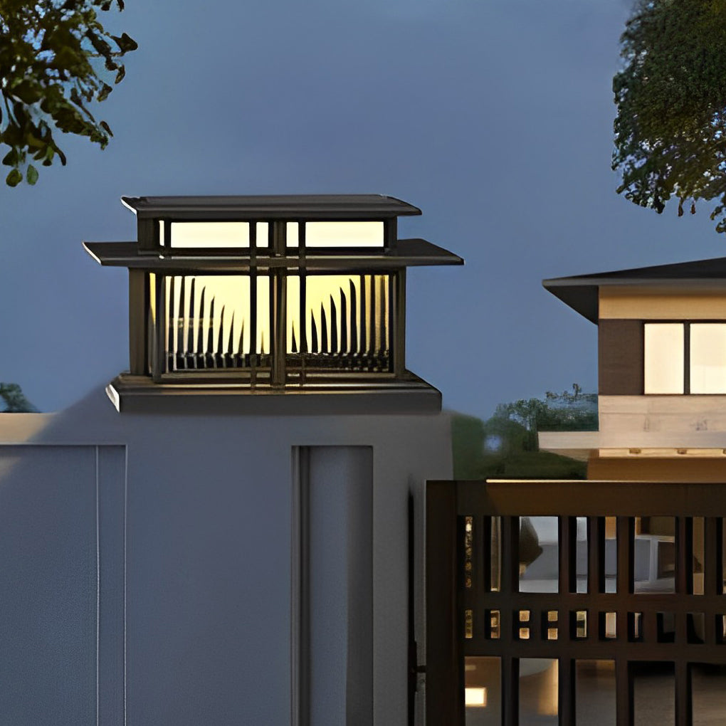 Contemporary pillar light mounted on a tall exterior column for architectural outdoor lighting.