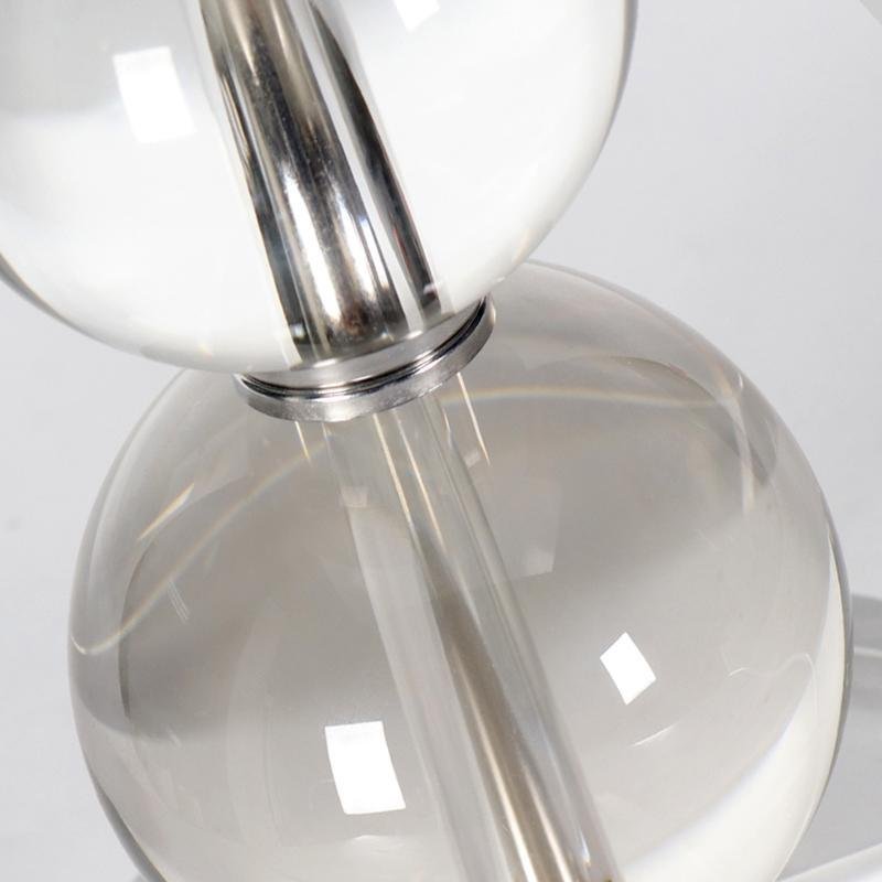 Crystal ball table lamp glass sphere detail showing clear transparent finish.