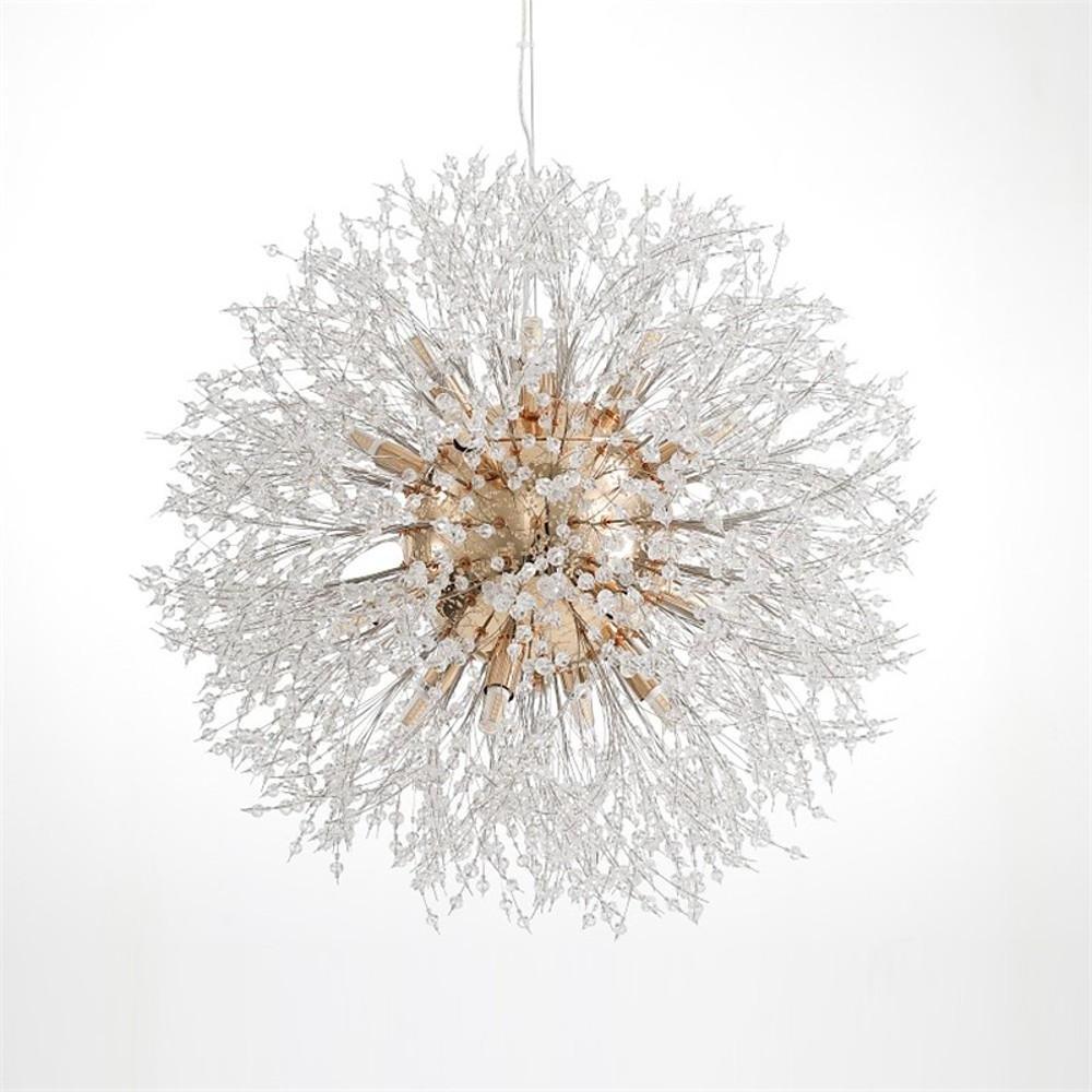 Crystal dandelion chandelier illuminating a luxurious dining space with ambient light.