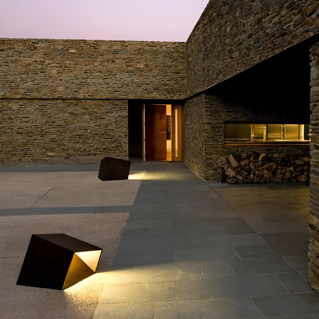 Geometric cube path light offers stylish outdoor lighting with energy-efficient LED performance for pathways and landscaped areas.