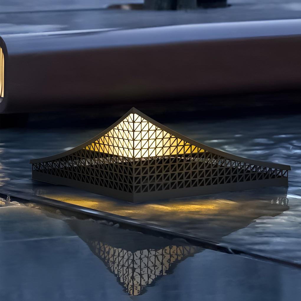 Curved landscape light providing soft illumination along a reflective water feature.