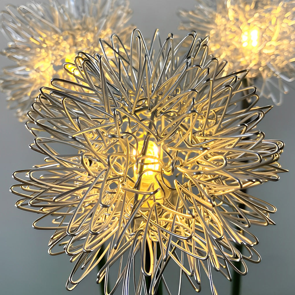 Close-up of dandelion landscape lights, showcasing the detailed LED structure and warm illumination.