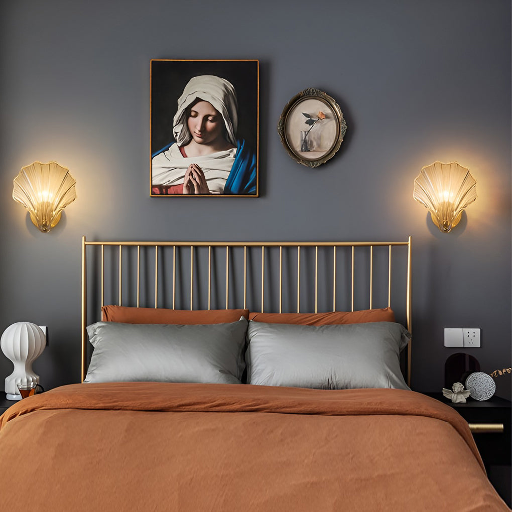 Create a warm ambiance with seashell-shaped glass wall lamp elegant LED home lighting, ideal for contemporary interiors.