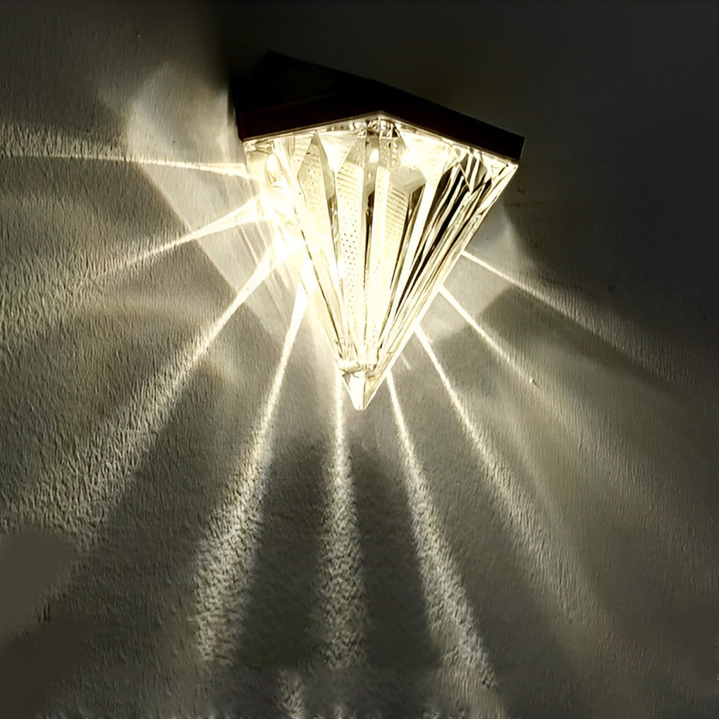 Diamond wall lights with close-up of their geometric design and light output.