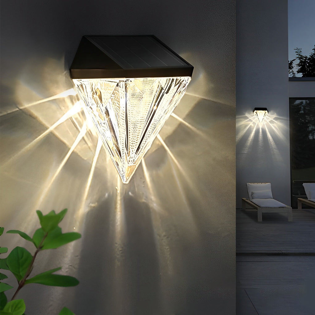 Diamond wall lights providing elegant illumination for a contemporary patio.