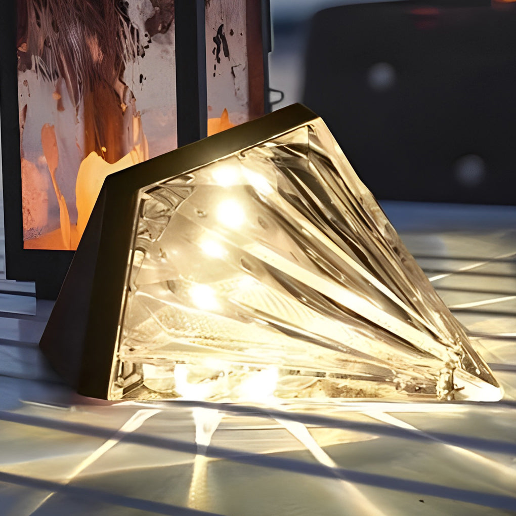 Diamond wall lights with detailed view of their crystal-like structure.