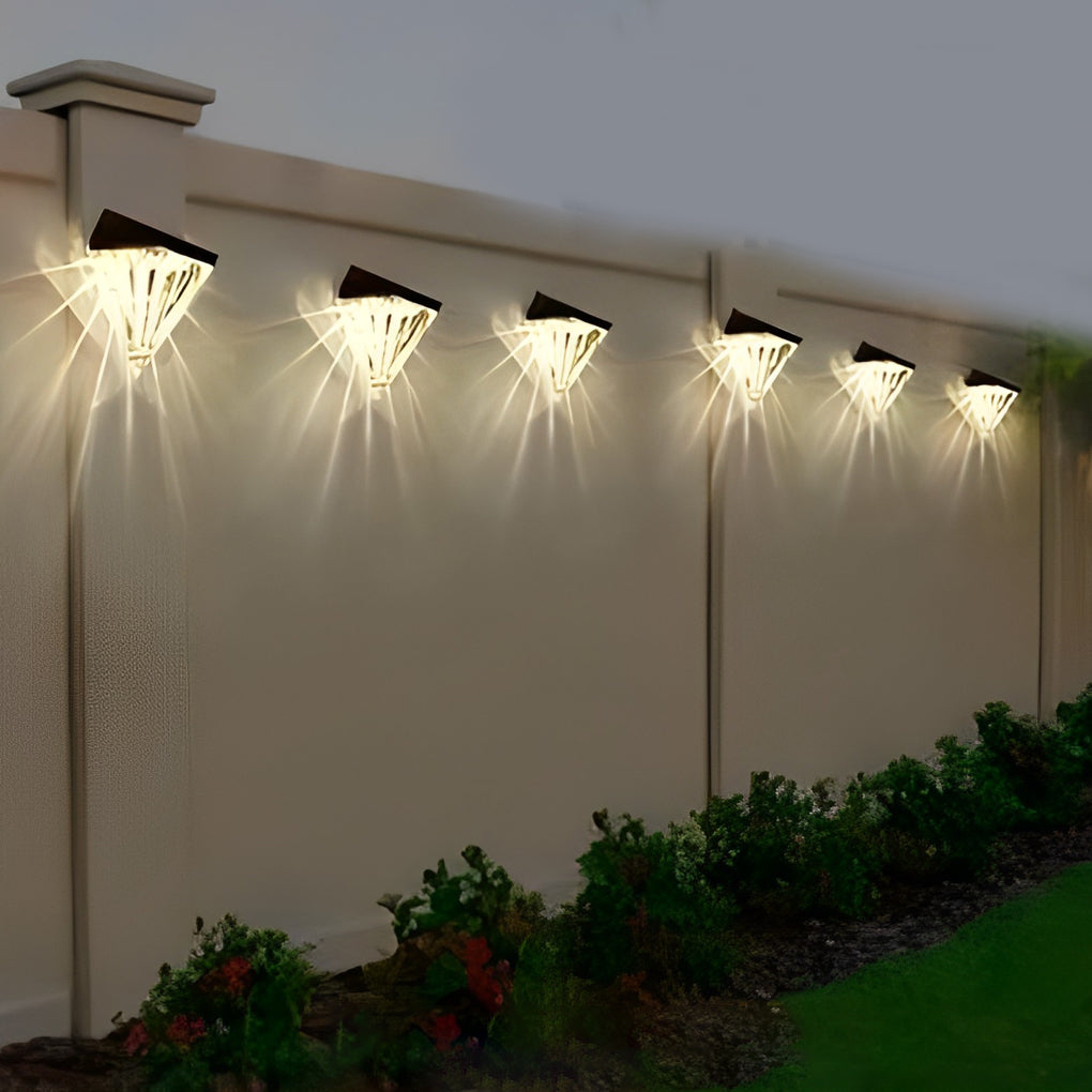 Diamond wall lights illuminating a modern outdoor staircase with elegant ambient glow.