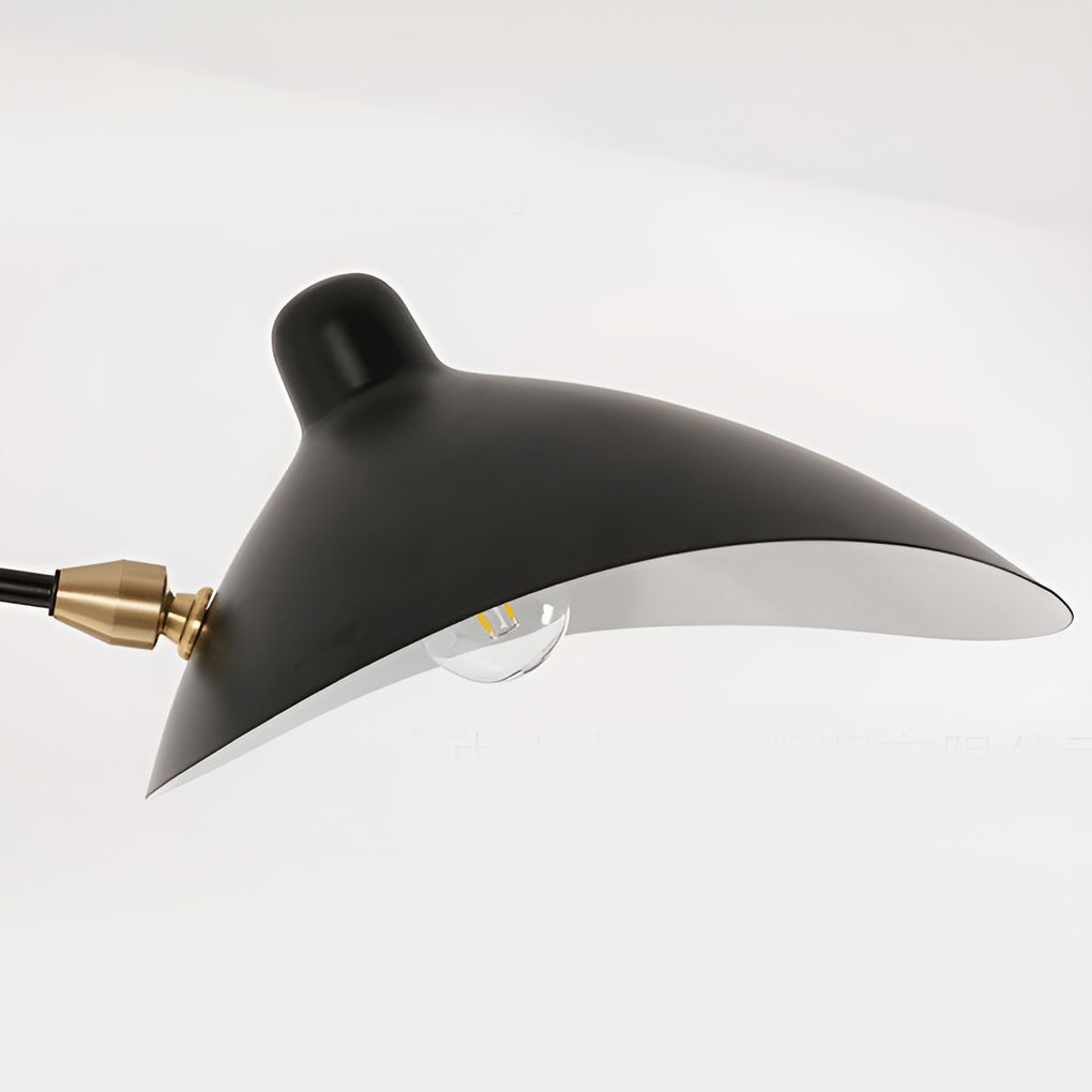 Double arm wall sconce close-up highlighting curved lampshade and adjustable joint construction.