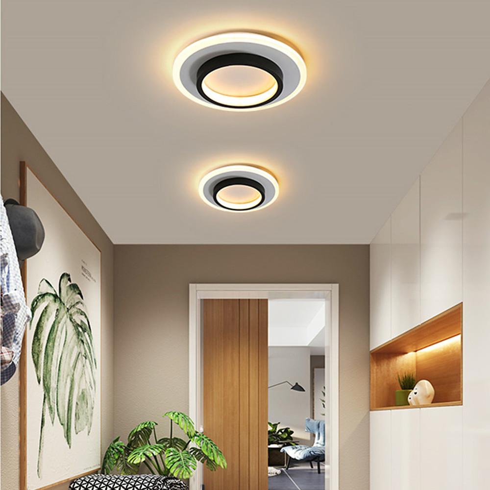 Double ring flush mount enhancing a stylish living room with sleek, minimalist design.