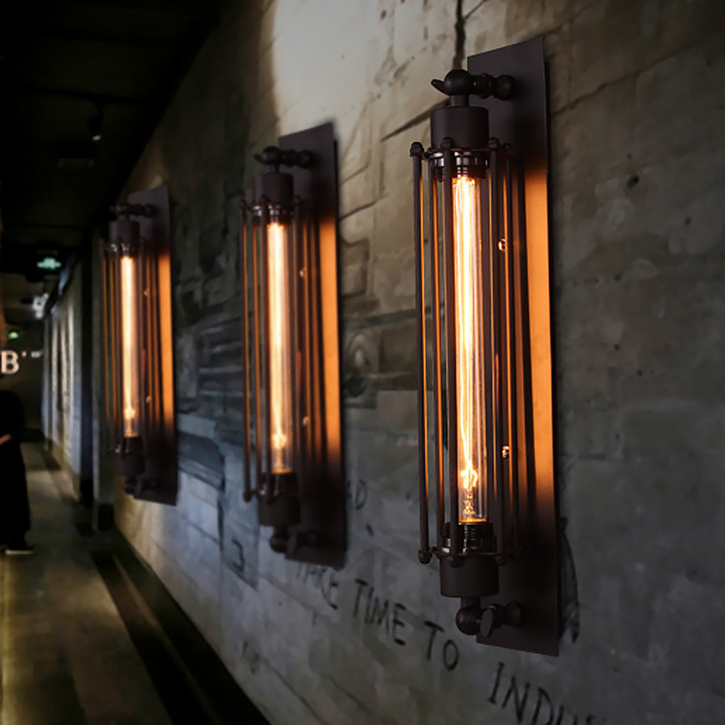 Vintage industrial wall sconce featuring dual exposed bulbs, installed in a narrow hallway for retro illumination.