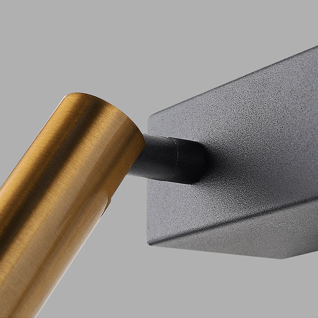 Close-up of the adjustable brass reading light on a dual light wall sconce.