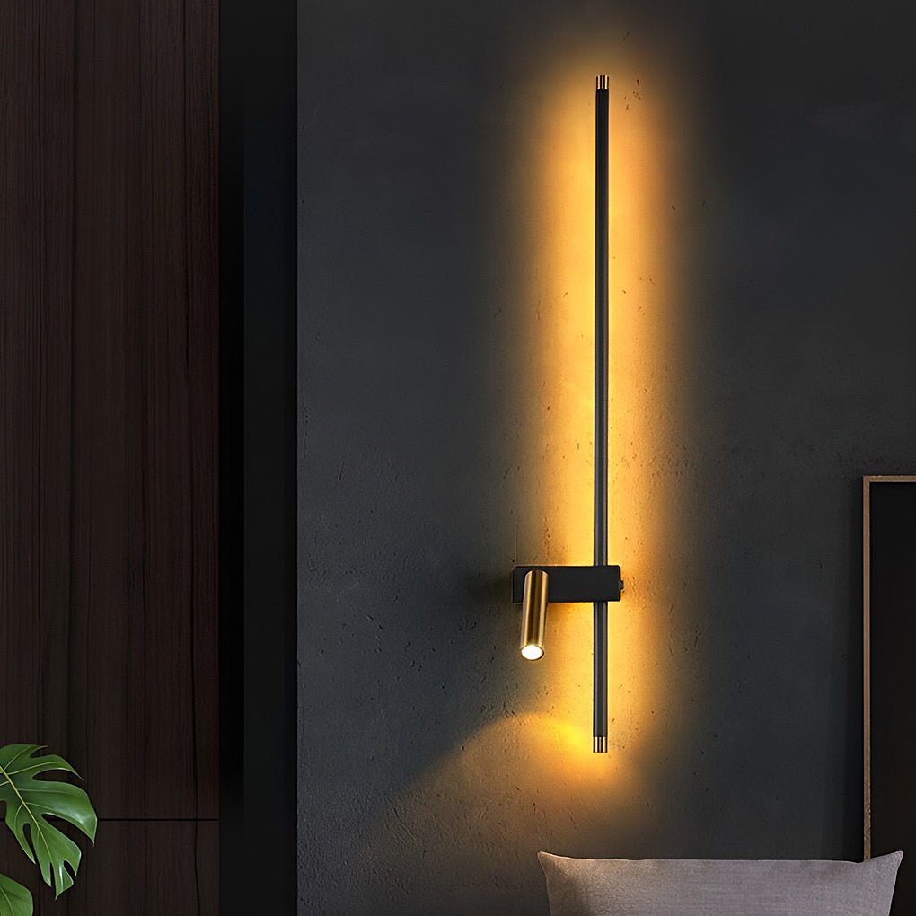 Dark-toned interior featuring a vertical dual light wall sconce with soft ambient illumination.