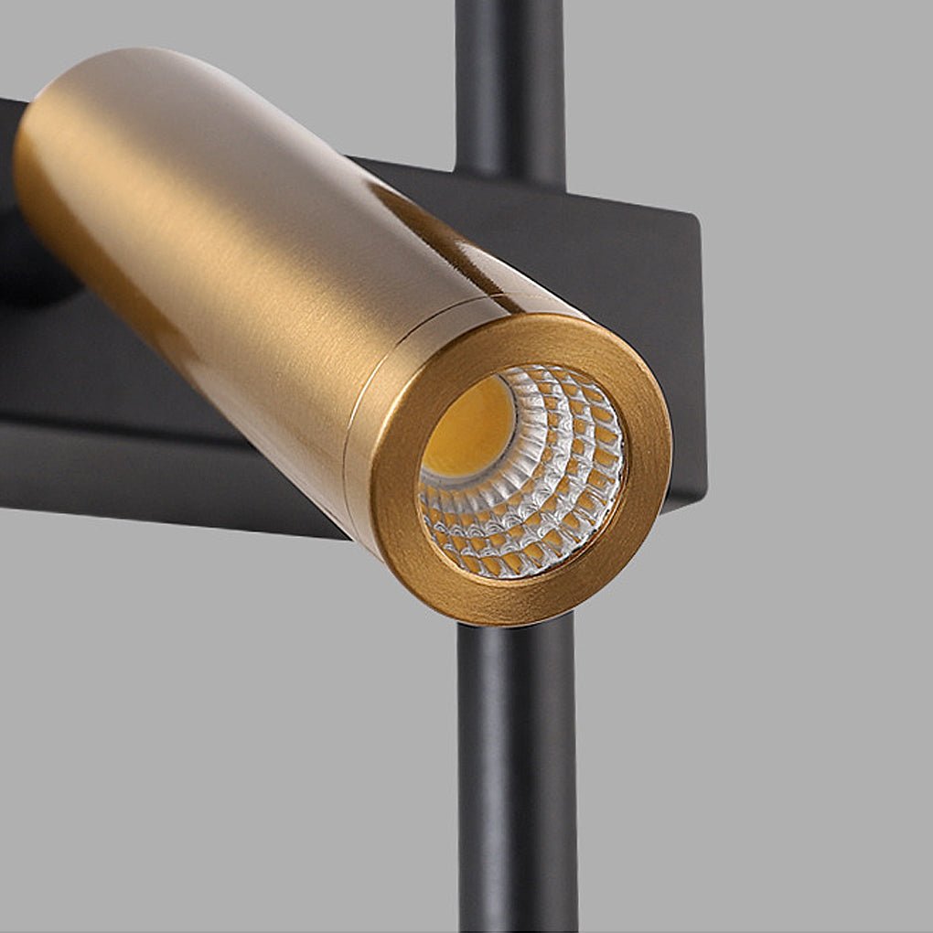 Detailed view of the cylindrical spotlight head on a modern dual light wall sconce.